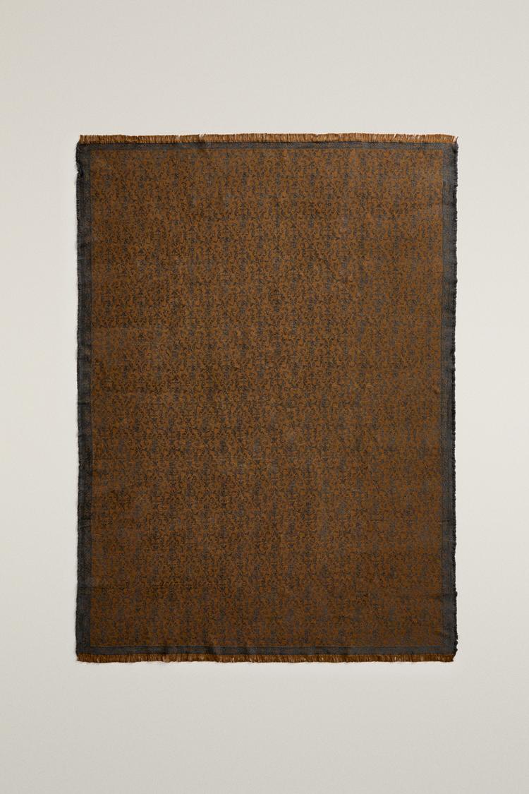 Wool jacquard fringe blanket