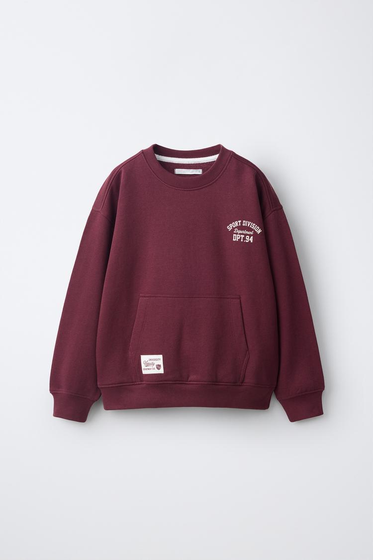 ТОЛСТОВКА С КАРМАНОМ В СТИЛЕ VARSITY