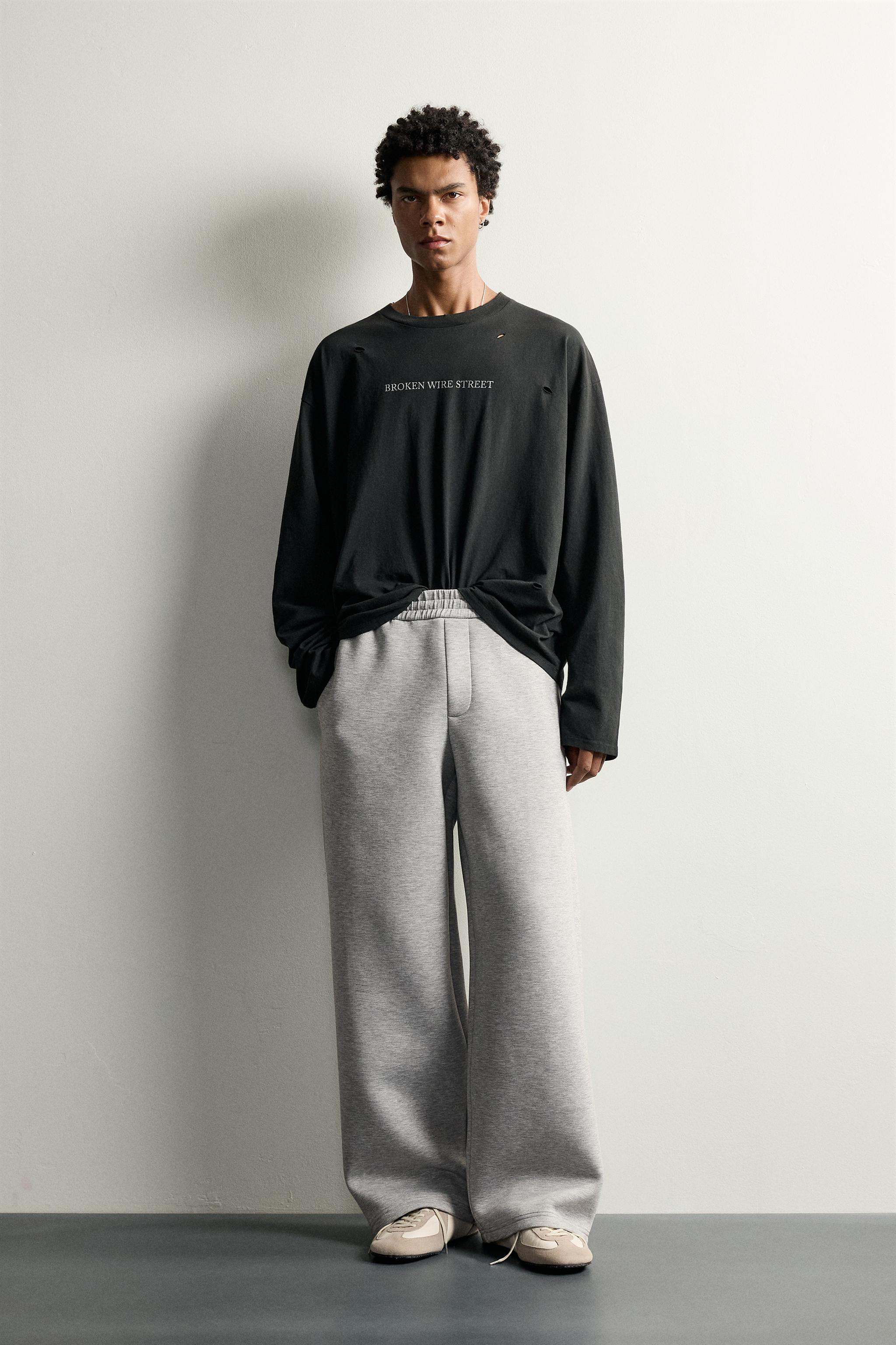 Футболка relaxed fit с эффектом разрезов и принтами — ZARA