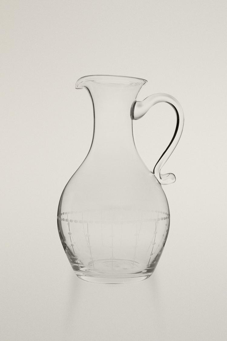 GLASS JUG WITH GEOMETRIC ENGRAVING